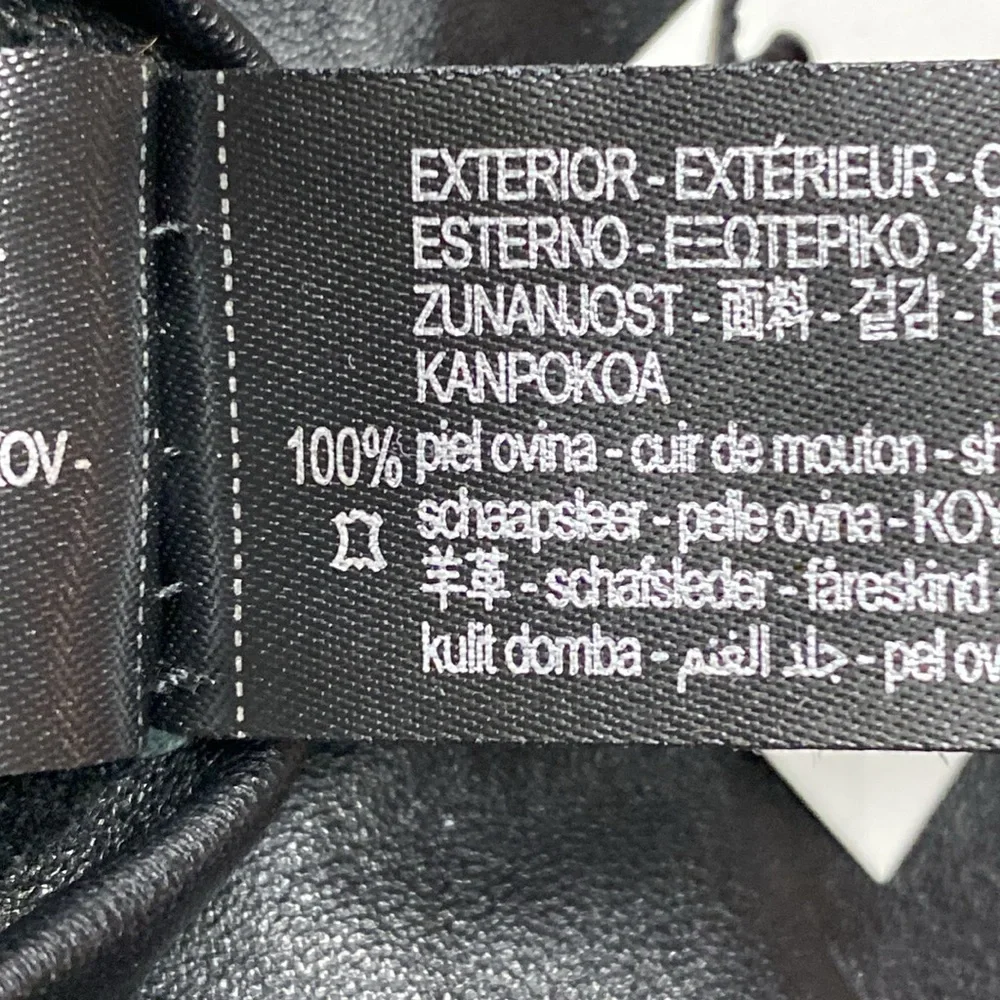 NWT. Zara Black Leather gloves with metal bracelets. Size M.